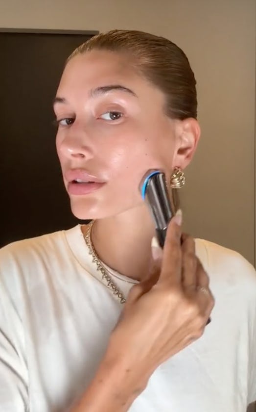 Hailey Bieber using the Medicube Age-R Booster-H