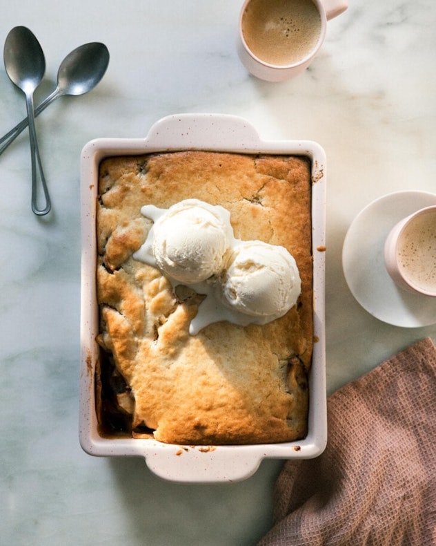 Apple cobbler with ice cream on top, a fall dessert for Thanksgiving that isn't pie.