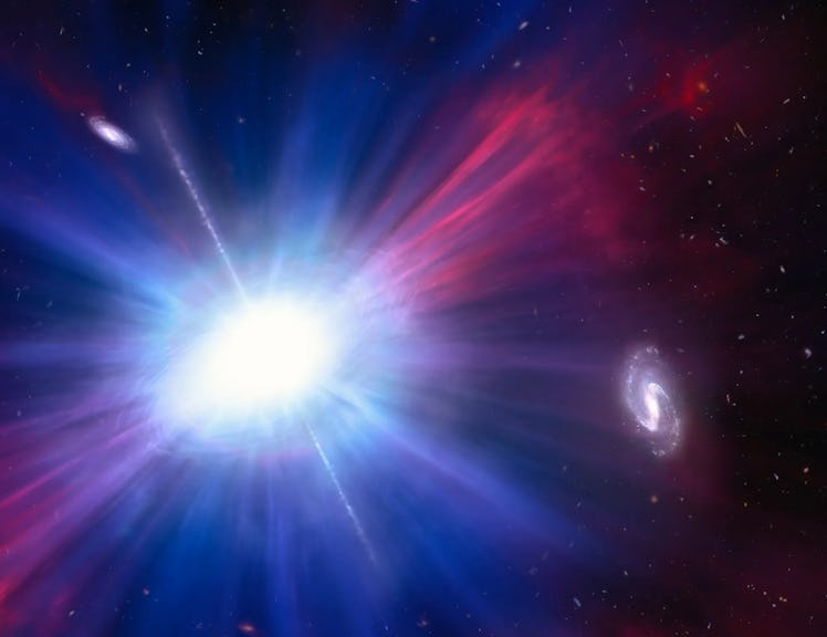 color image of a bright blue explosion with two distant galaxies in the background