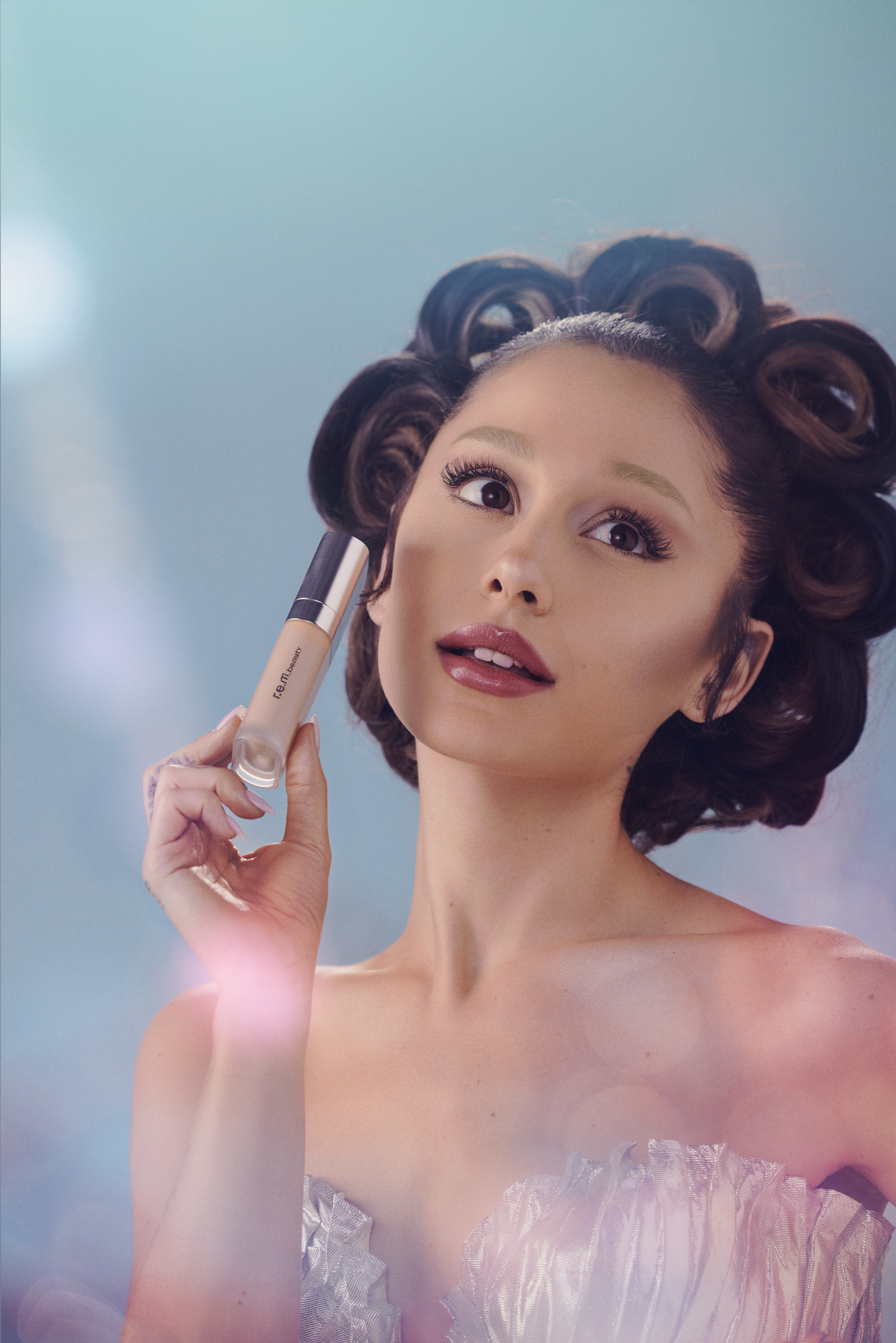 Ariana Grande pictured with the r.e.m. beauty Sweetener Foundation.