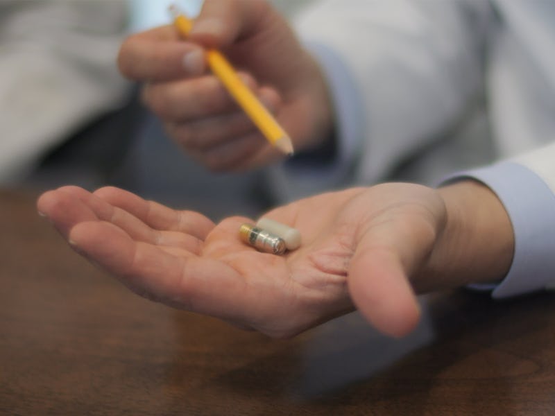 Ali Rezai, MD, holds the Celero VMPill