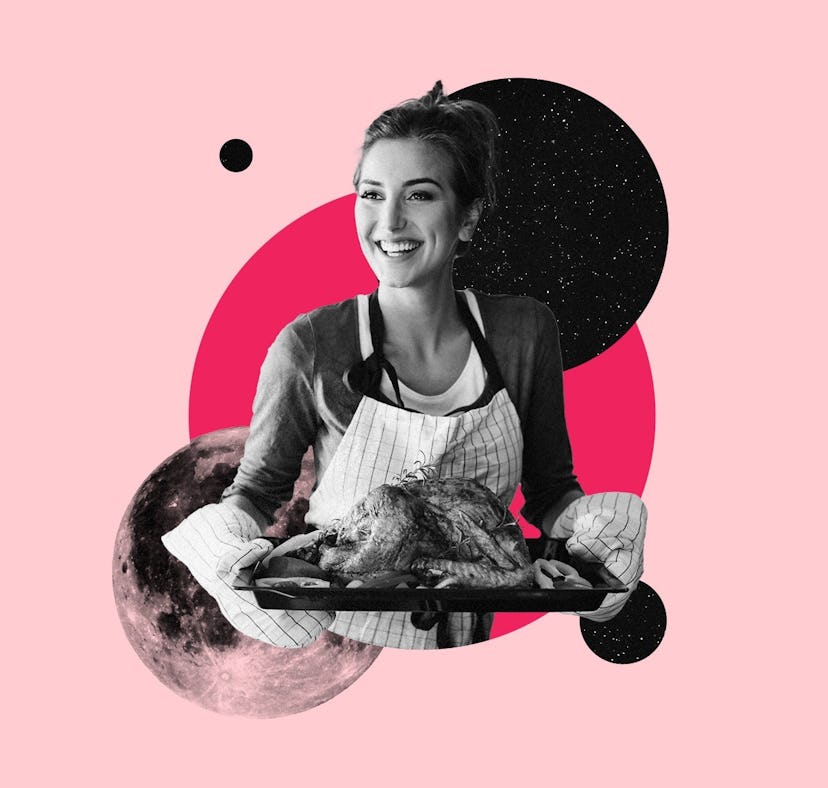 Young woman holding a turkey as she waits to hear her Thanksgiving 2023 horoscope, per her zodiac si...