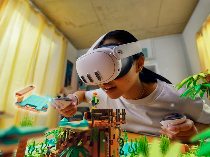 A person wearing a Quest 3 mixed reality headset to play a virtual tabletop game