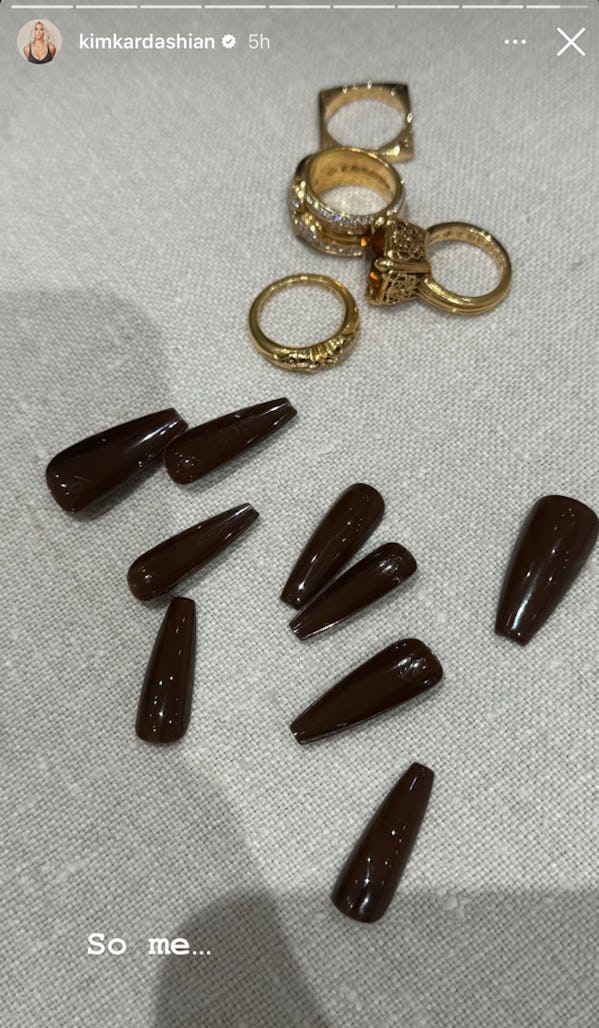 Kim Kardashian shares her dark chocolate brown press-on nails on her Instagram stories.
