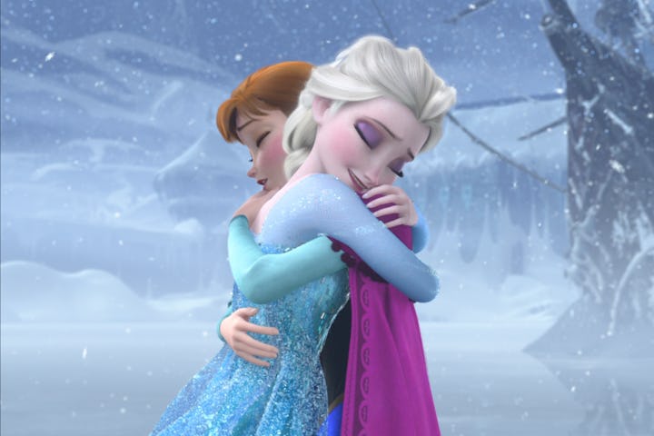 Still from Frozen showing Anna and Elsa hugging.