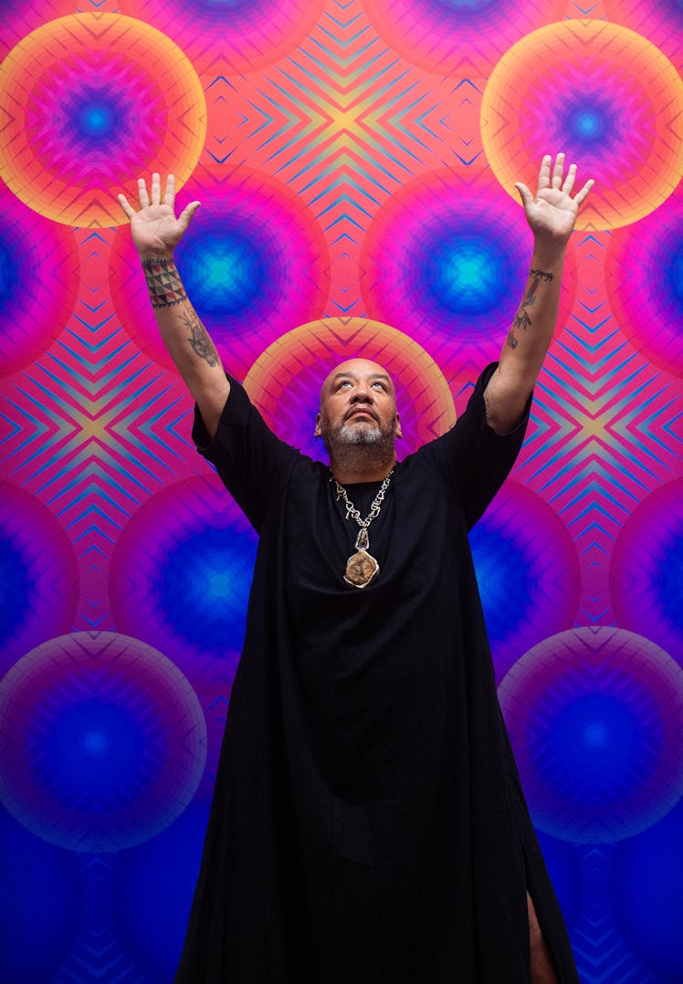 Jeffrey Gibson, with Ancestral Superbloom, 2023, wears his own clothing and jewelry.