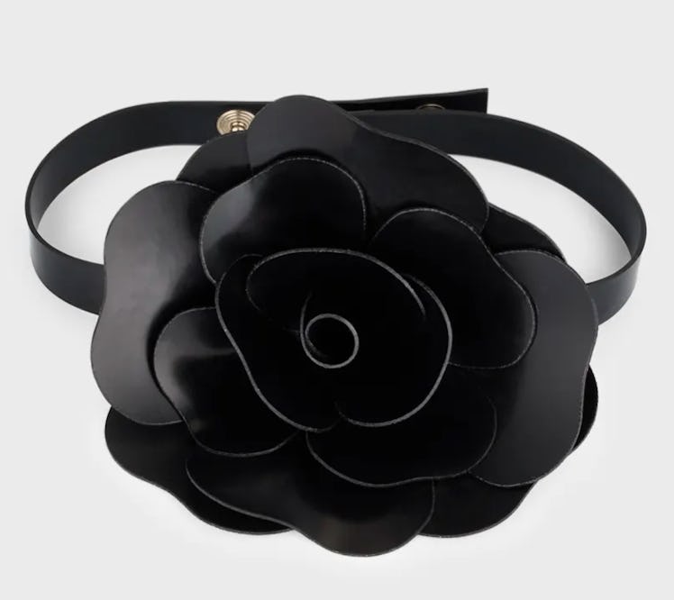 black flower brooch