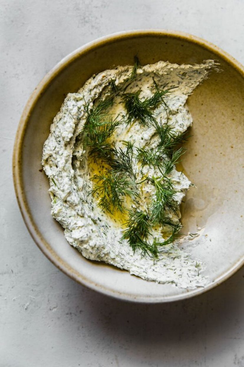 Garlic herb goat cheese spread, an easy Thanksgiving appetizer.