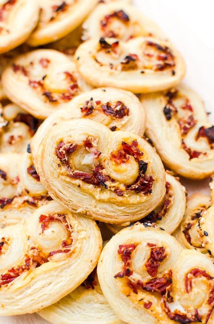 Palmiers with sun-dried tomatoes and cheese, a shareable Thanksgiving appetizer.