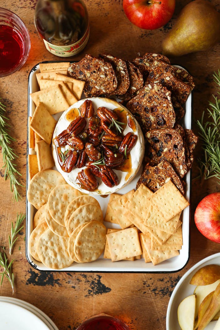 Maple pecan baked brie and crackers, a shareable Thanksgiving appetizer.