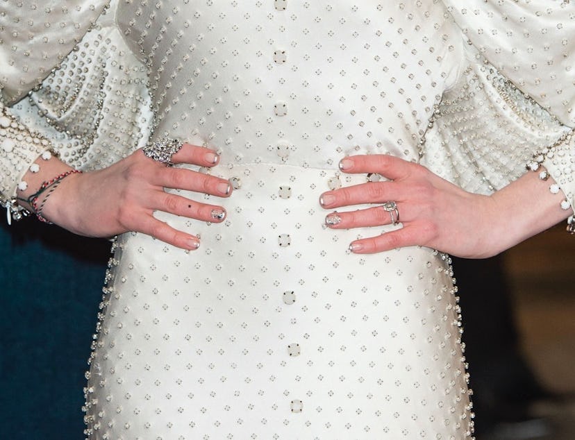 Anne Hathaway silver nail art on short natural nails