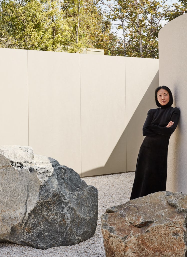 Gallerist Esther Kim Varet, at her Los Angeles home, wearing a Balenciaga gown.