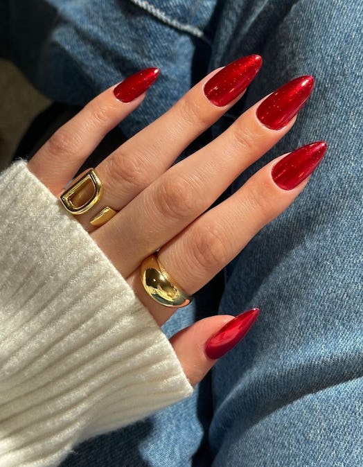 Red chrome nails are on-trend for Sagittarius season 2023.
