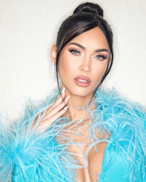 Megan Fox blue feather dress and white nails