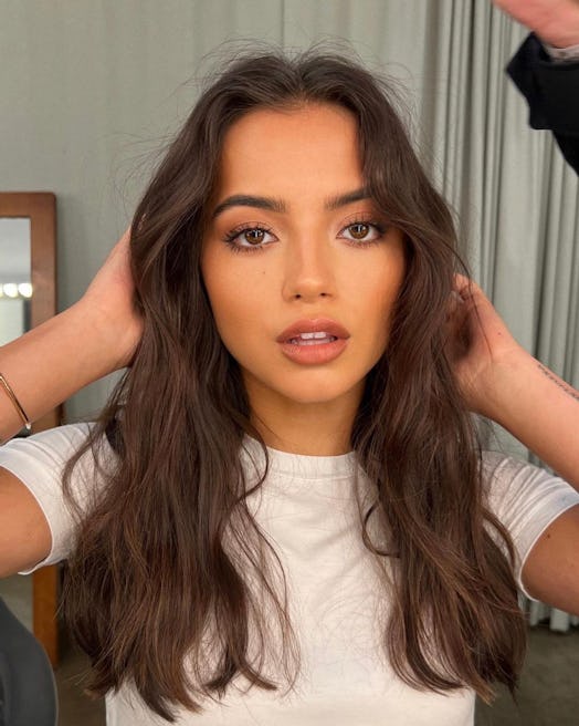 Isabela Merced's warm and bronzed makeup is a quick & simple Thanksgiving makeup look for 2023, acco...