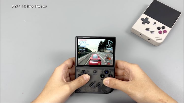 Anbernic RG35XX Plus handheld running the PSP game Ridge Racer
