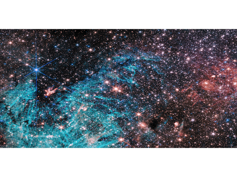 In a field crowded with stars, a funnel-shaped region of space appears darker than its surroundings ...