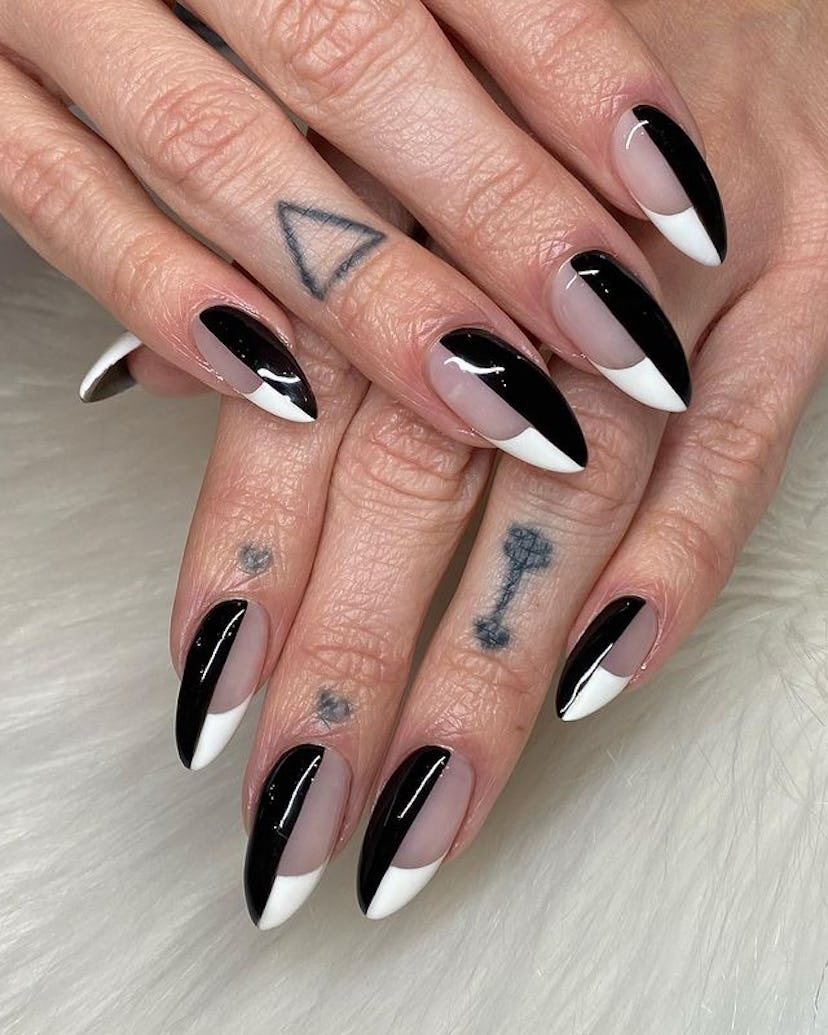 Black and white half and half nails.