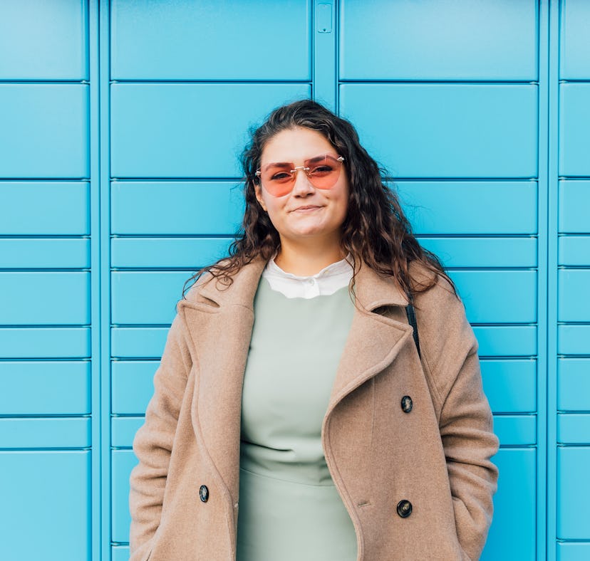 Young woman wearing tinted sunglasses during the November 2023 full Beaver Moon.