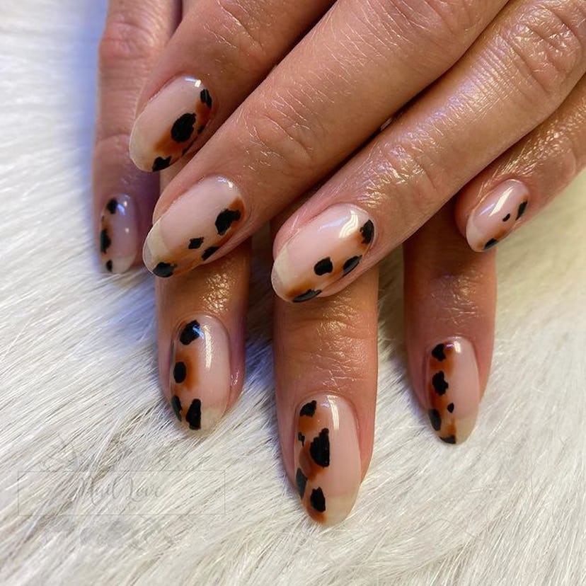 Half leopard nails.