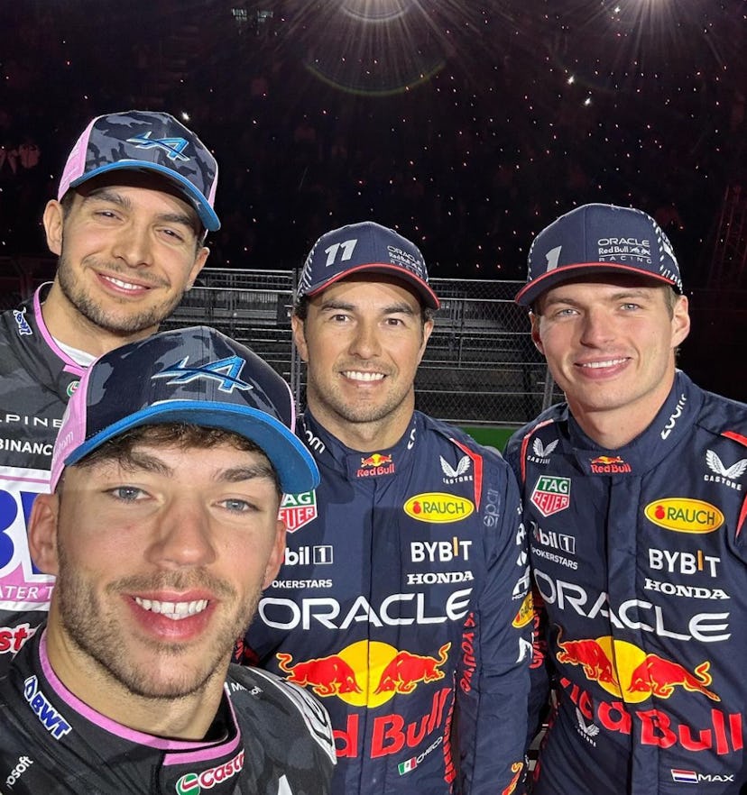 Eteban Ocon, Pierre Gasly, Segrio Pérez, and Max Verstappen grin in a selfie during the opening cere...