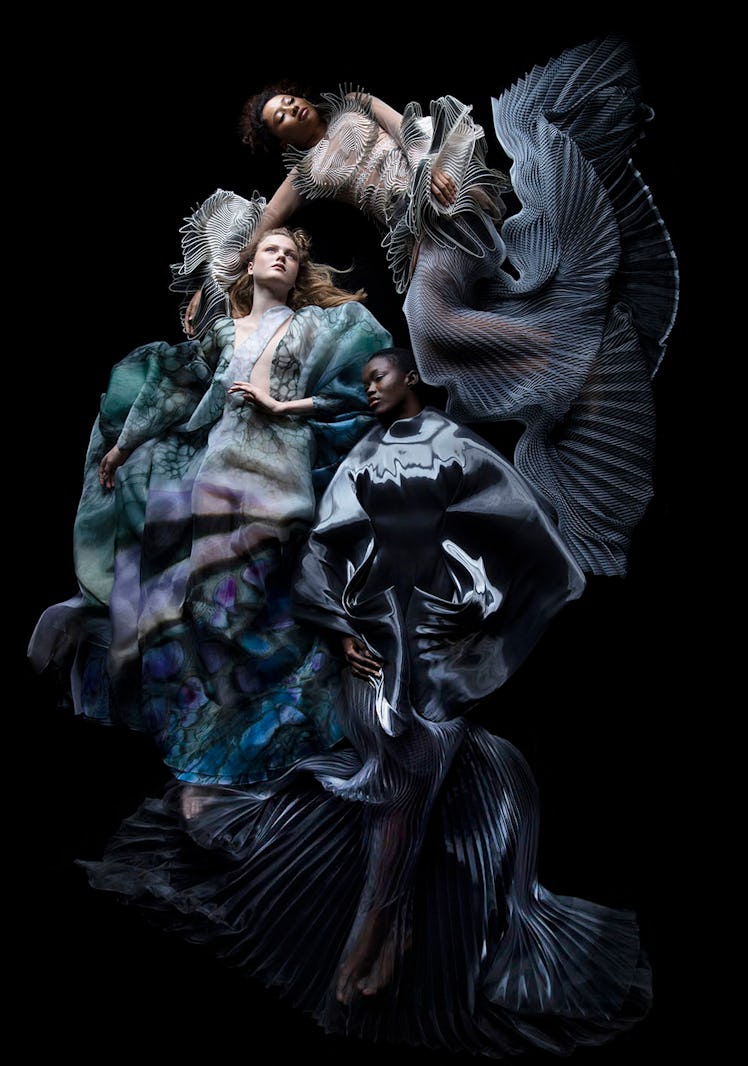 three models wearing iris van herpen dresses