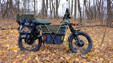UBCO electric cargo bike in a forest.