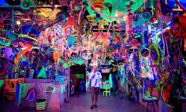 Kenny Scharf in an installation of his design