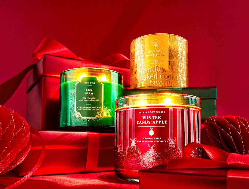 Bath & Body Works three-wick candles in Christmas scents, part of the Bath & Body Works Candle Day S...
