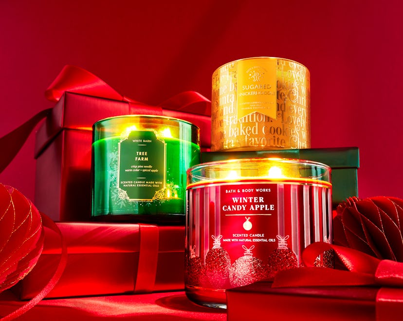Bath & Body Works three-wick candles in Christmas scents, part of the Bath & Body Works Candle Day S...