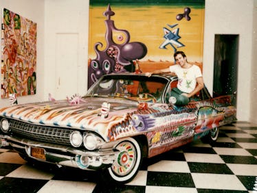 Kenny Scharf on a car he painted