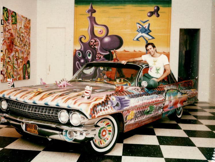 Kenny Scharf on a car he painted
