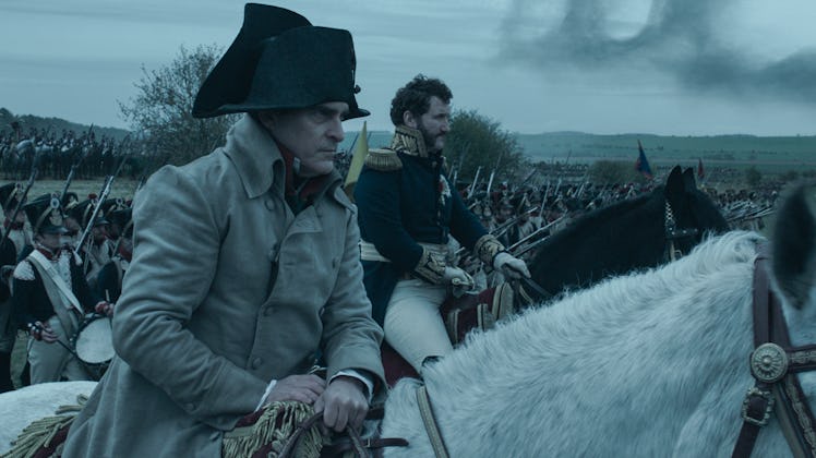 Napoleon Bonaparte (Joaquin Phoenix) sits on a horse in 'Napoleon'