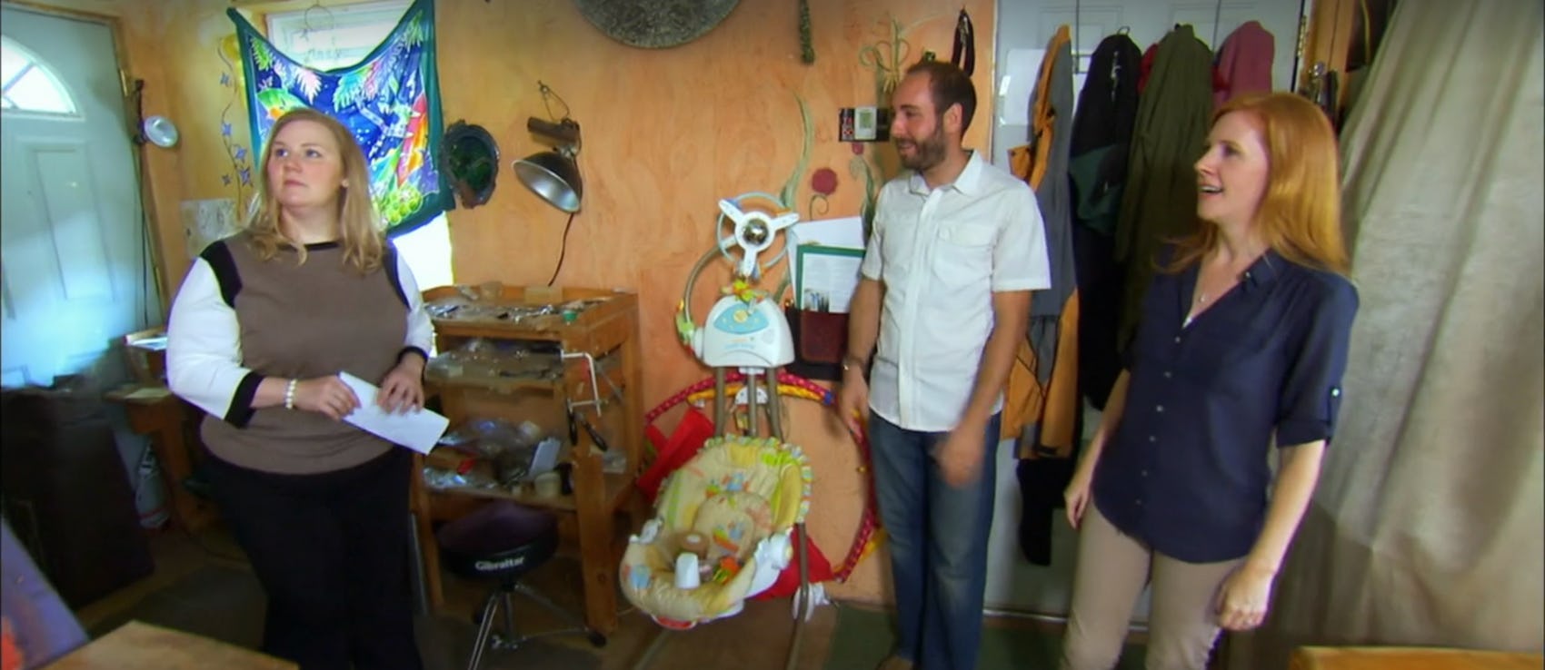 Newlyweds look at a tiny house on &lsquo;Tiny House Hunters.'