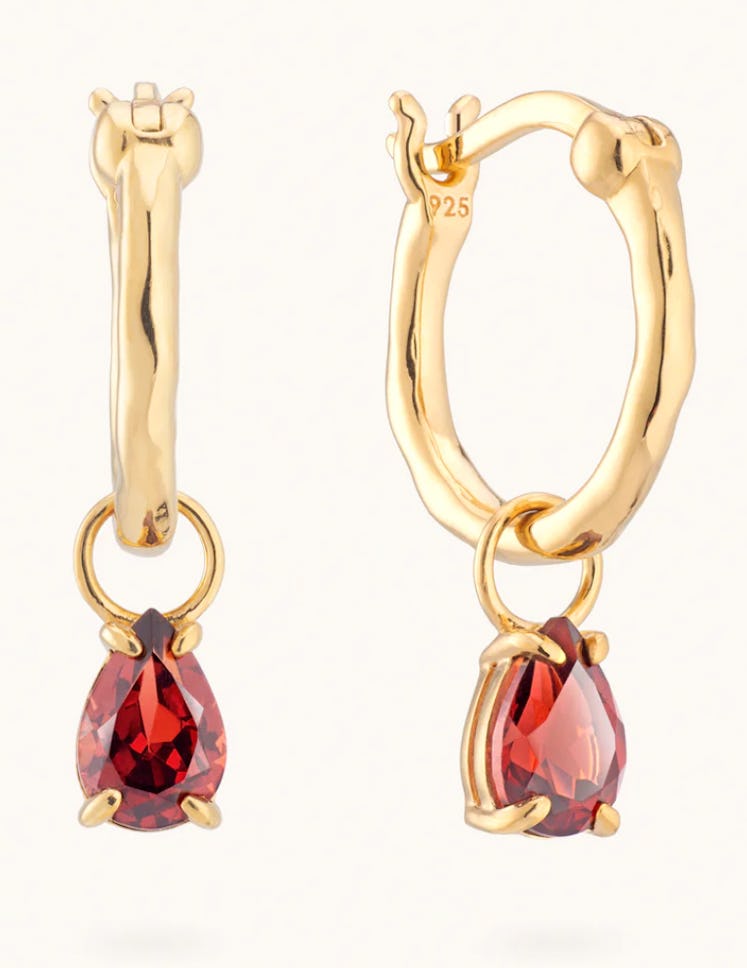 gold hoops with garnet charm