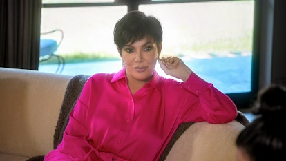 Kris Jenner sitting on 'The Kardashians.'