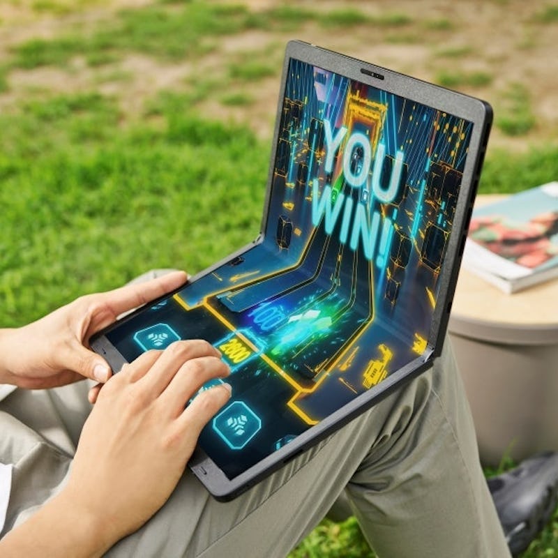 The LG Gram Fold being used to play a game on someone's lap.