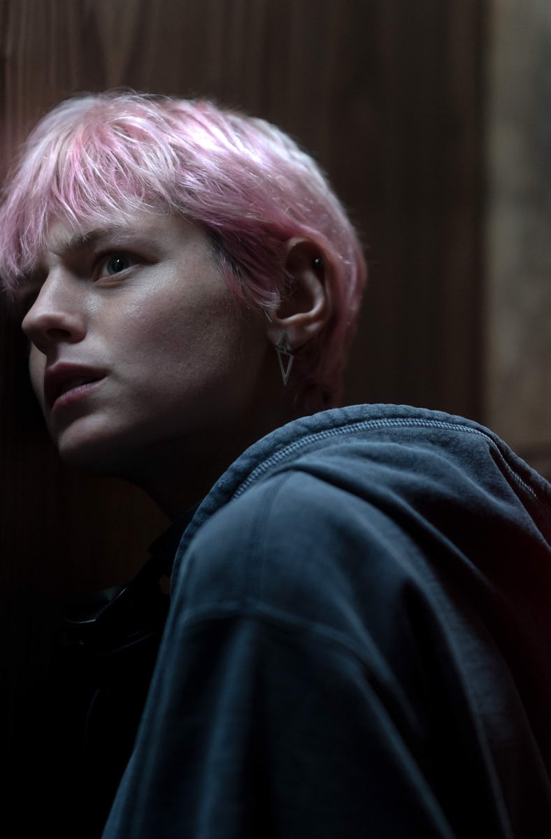 Emma Corrin as Darby Hart in A Murder at the End of the World