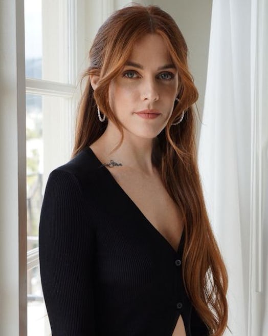 Riley Keough with gingerbread hair.