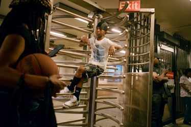 Man in subway turnstile