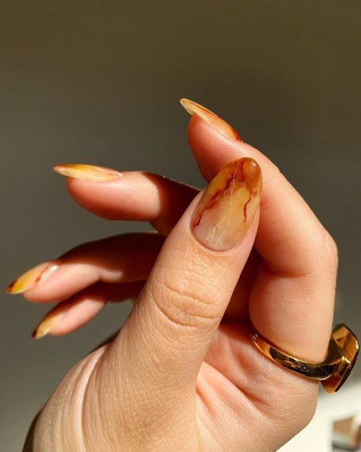 Warm amber quartz nails that match the cabincore aesthetic.