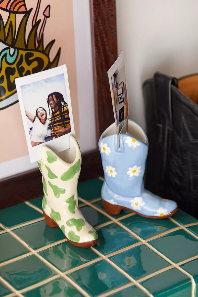 The Cowboy Boot Photo Holder from Urban Outfitters is a great holiday 2023 gift.