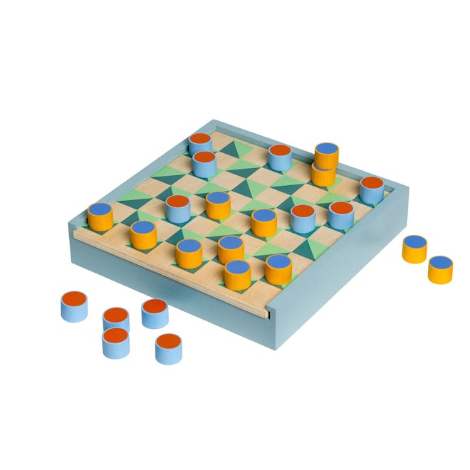 This 2-in-1 Checkers and Chess set from West Elm makes for a great holiday 2023 home decor gift.