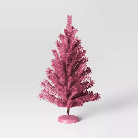A mini pink Christmas tree is great for your desk. 