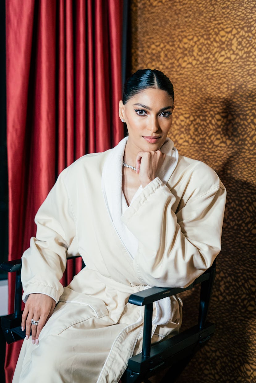 prikita swarup cat eye liner and slicked back bun