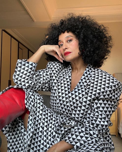 Tracee Ellis Ross big curls and red lipstick