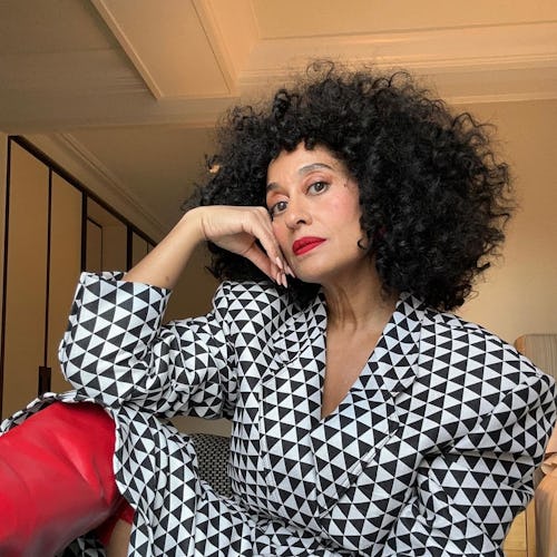 Tracee Ellis Ross big curls and red lipstick