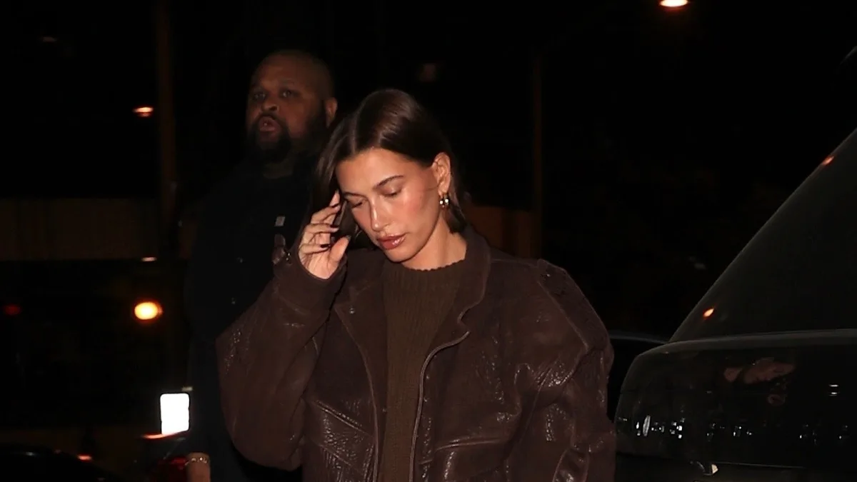 Hailey Bieber's Pantless Look Mixes a Boxy Moto Jacket With a Quirky Prep Shoe Hailey Bieber's Pantless Look Mixes a Boxy Moto Jacket With a Quirky Prep Shoe