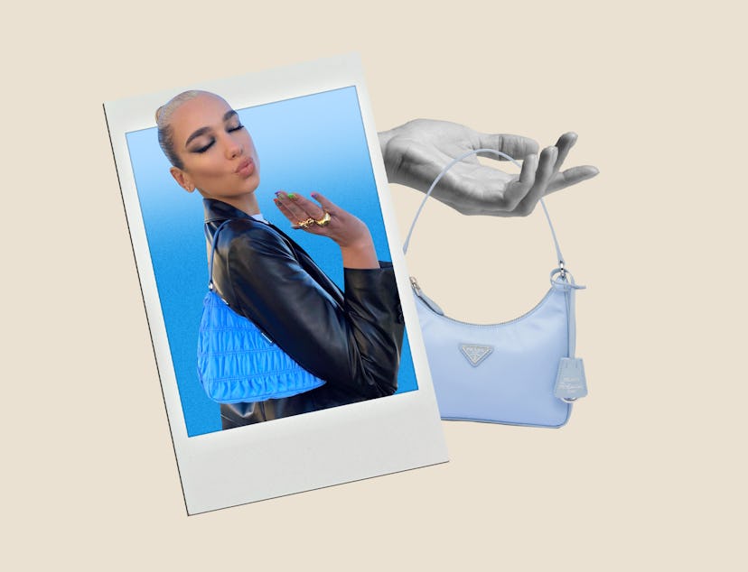 Dua Lipa wears the Prada Re-Edition 2005, a Prada Re-Edition 2005 bag.