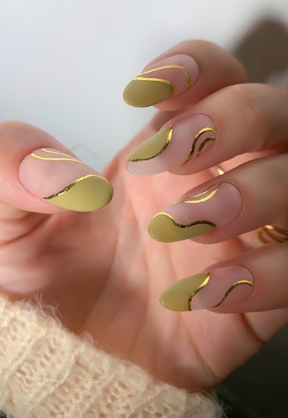 Gold foil matcha nails.